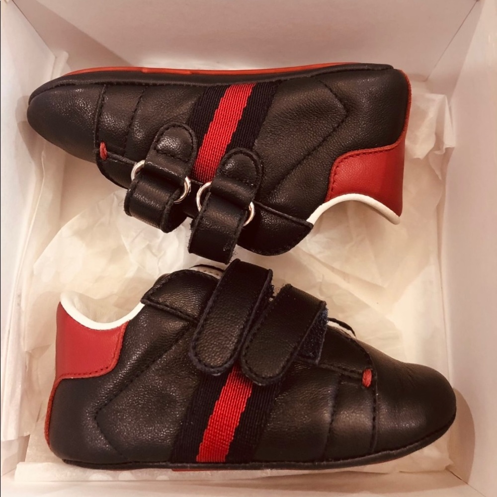 Dark blue baby Gucci shoes with red stripes size 17.